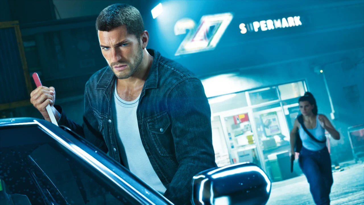 GTA 6 screenshot from Edge — Jason at the open door of a car outside a 24/7 supermarket at night as Lucia runs out of the shop with a pistol