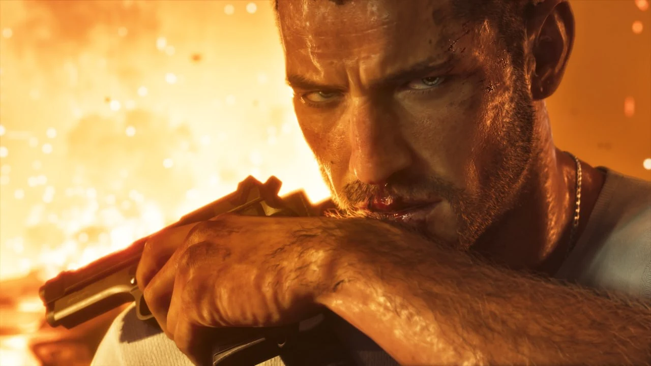 GTA 6 screenshot from Edge — a close-up of Jason holding a pistol with fire burning behind him