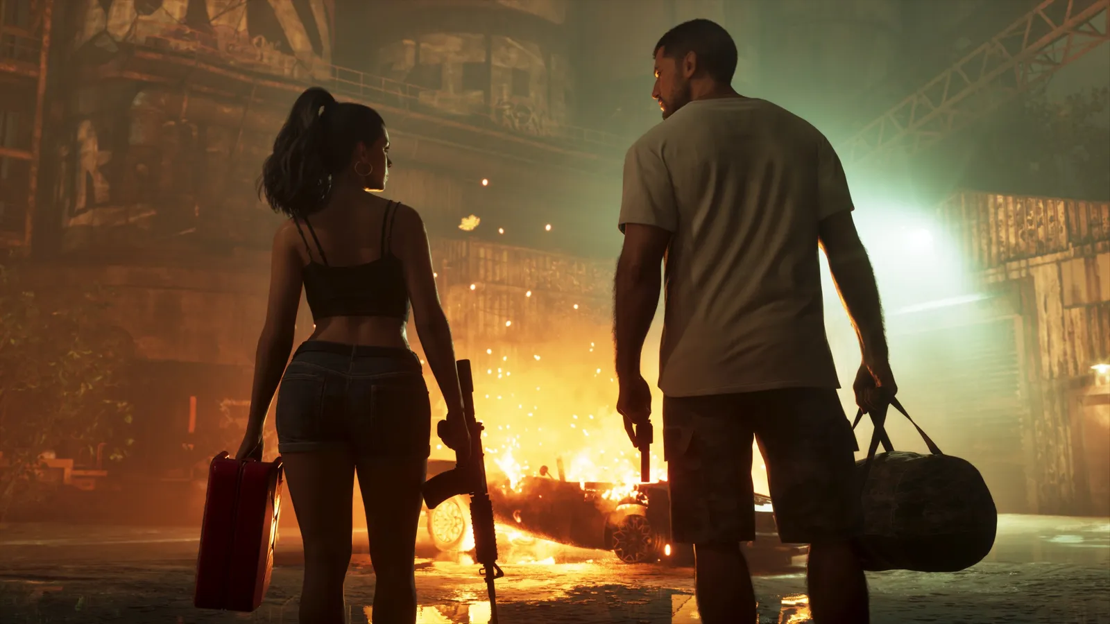 Official GTA 6 screenshot — Jason and Lucia walking away from a burning car, firelight on wet asphalt (An Extended Look)