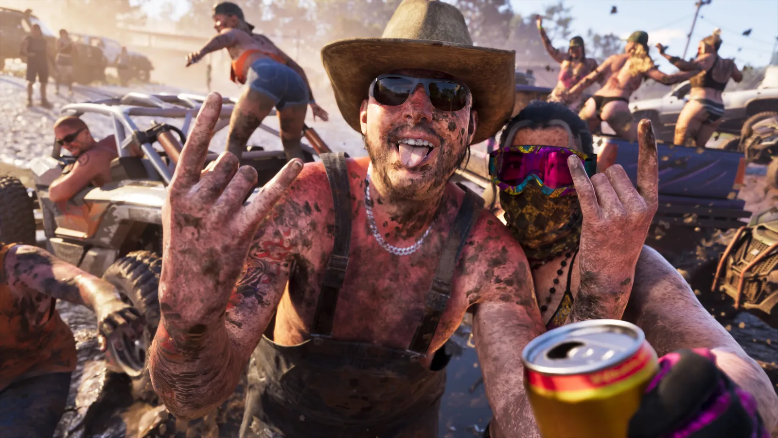 A mud-covered crowd around off-road buggies — official image from An Extended Look