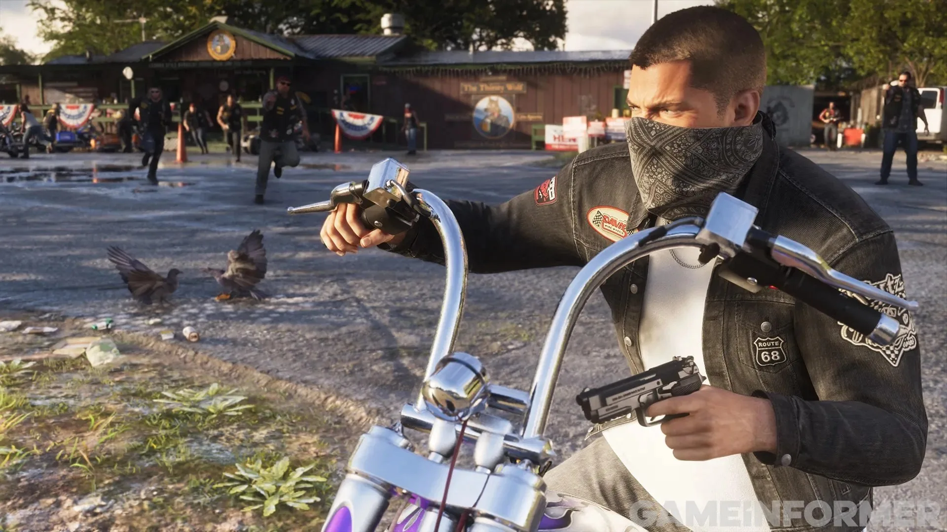 GTA 6 screenshot from Game Informer — Jason in a bandana on a chopper aiming a pistol in front of a roadside bar