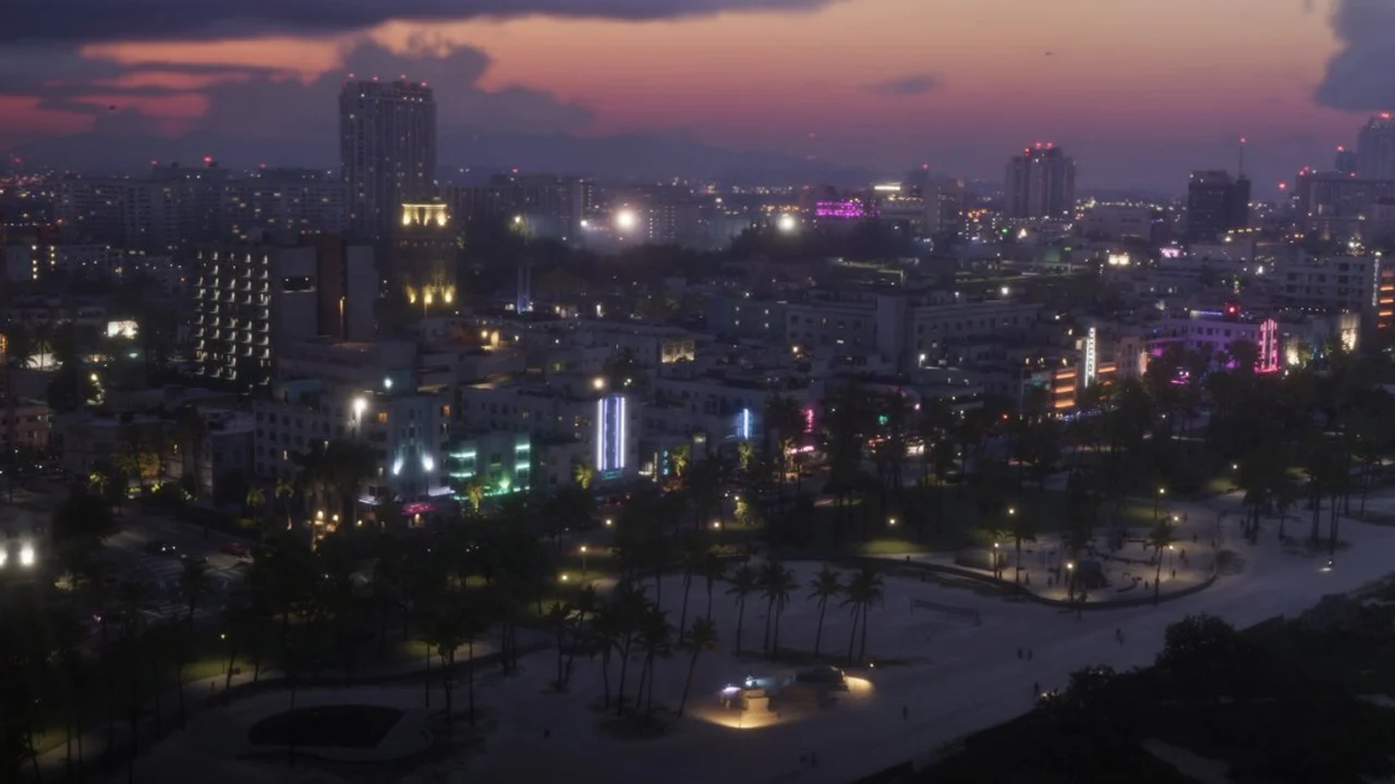 Frame from the GTA 6 Launch Trailer: the Vice City skyline and neon-lit streets at dusk