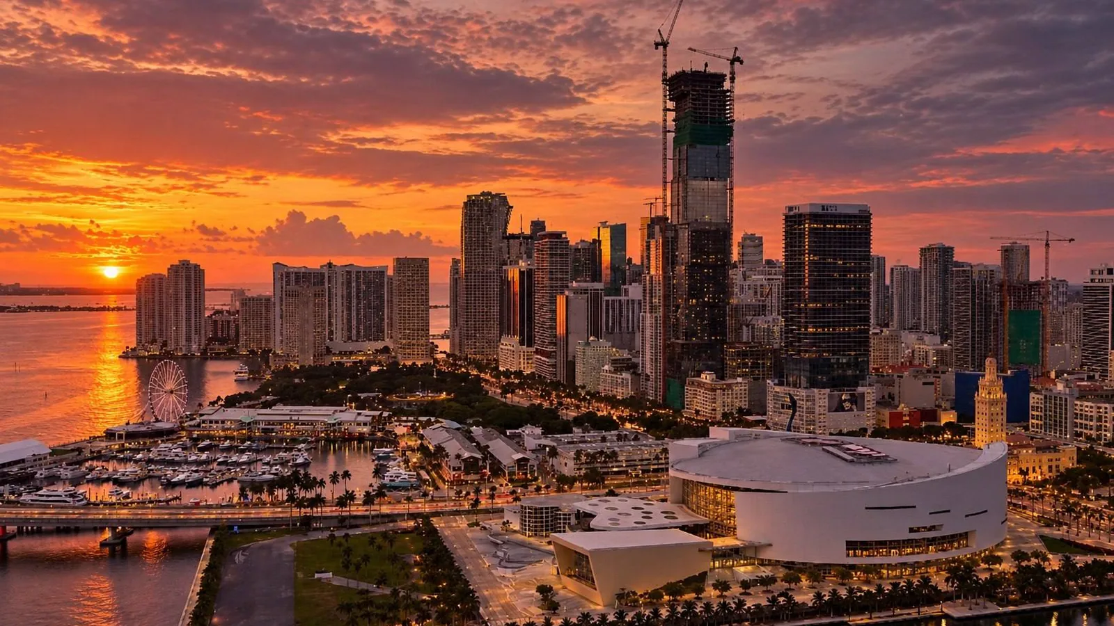 Real photo of downtown Miami at sunset: Kaseya Center, the Bayside marina, the Skyviews observation wheel, Freedom Tower and the Brickell skyline (photo shared online)