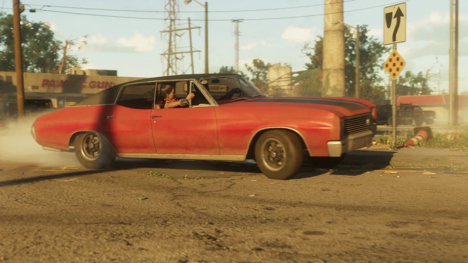 Lucia at the wheel of a red muscle car outside a pawn and gun shop — official Trailer 1 screenshot